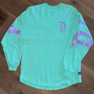 Disneyland Spirit Jersey Turquoise Long Sleeve Shirt with Purple Glitter Accent